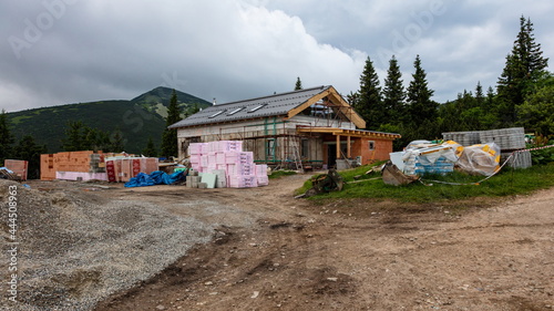 TERCHOVA, SLOVAKIA - JULY 3, 2021: Slovakia mountain hut "Chata pod Chlebom" in reconstruction. © Radek Vicar
