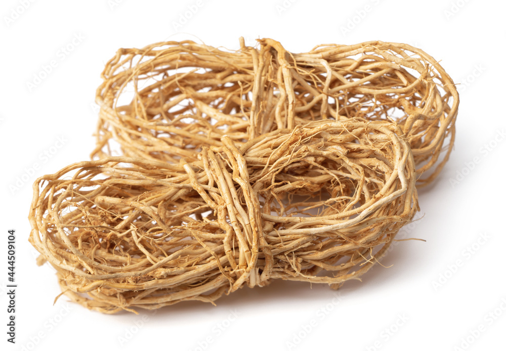 bunch of dried vetiver roots isolated on white background