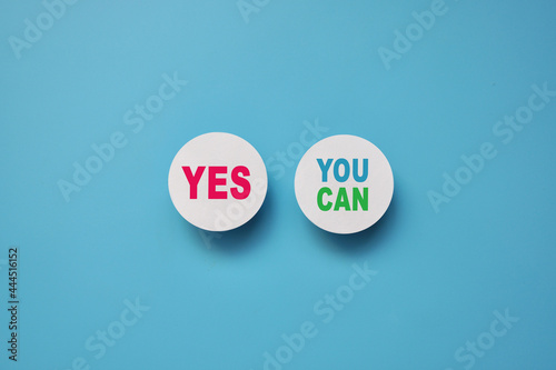 Motivational phrase on paper mugs: Yes, you can