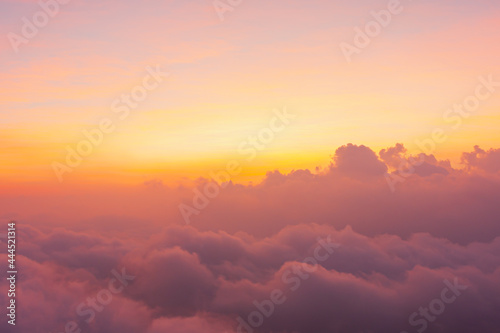 beautiful sunlight of sun while sunrise or sunset with soft cloud above peak mountain