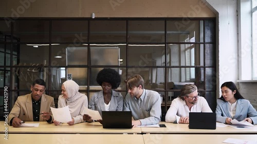Wallpaper Mural Multiethnic business team at work in their start up industrial office.  Torontodigital.ca