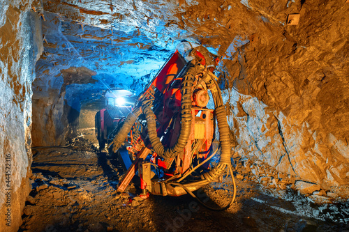 Underground drilling machine. Equipment for drilling blast holes and installing roof bolting