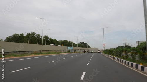 Shot of four lane road in India, Road divider footage