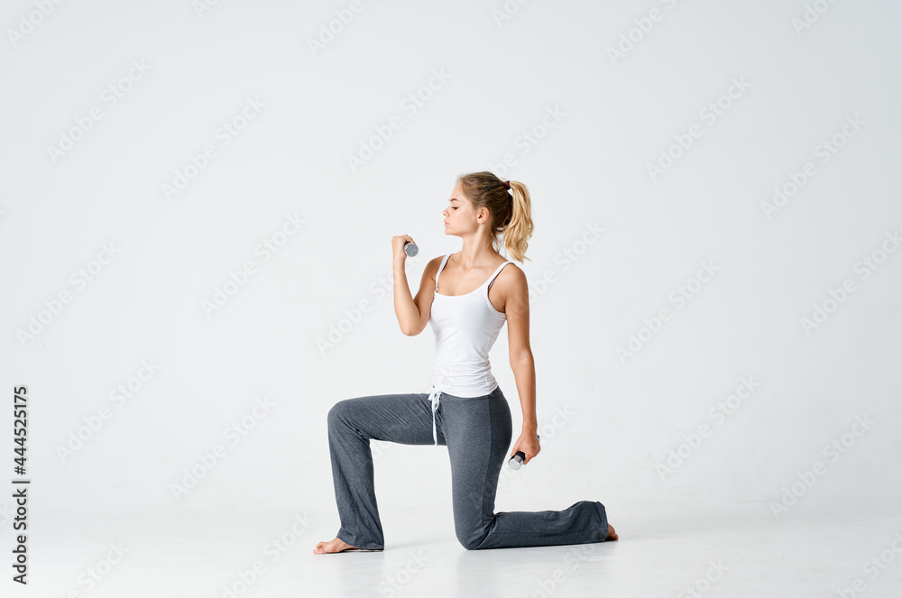 athletic woman with dumbbells exercise motivation workout slim figure athletic woman with dumbbells exercise motivation workout slim figure