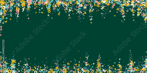 Falling letters of English language. Light flying words of Latin alphabet. Foreign languages study concept. Ravishing back to school banner on blackboard background.