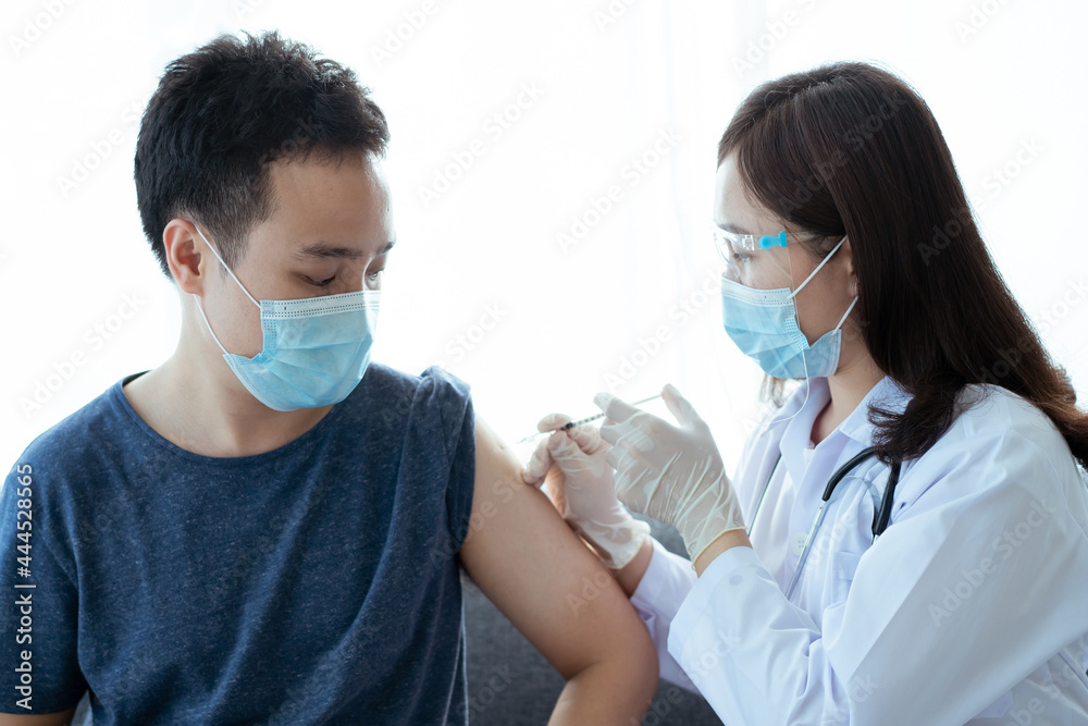 Asian young man very scare a vaccination shot.
