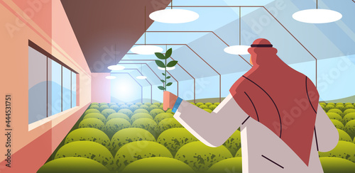 arab agricultural engineer researching plant in greenhouse agriculture scientist smart farming concept