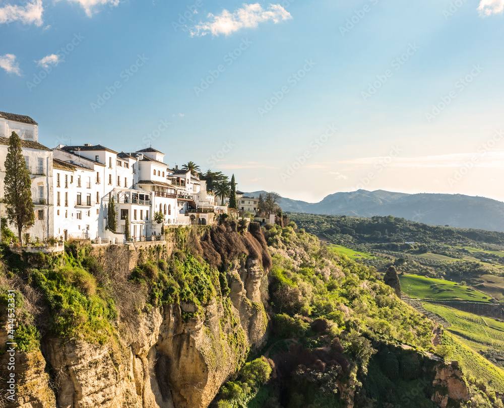 Ronda, Spain: Landscape of white houses on the green edges of steep cliffs