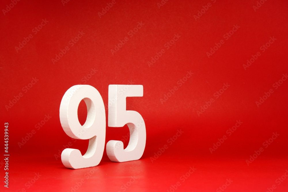 Ninety Five ( 95 ) white number wooden on Red Background with Copy Space - New promotion 95% Percentage , Birthday anniversary , Business finance Concept Ninety Five ( 95 ) white number wooden on Red Background with Copy Space - New promotion 95% Percentage , Birthday anniversary , Business finance Concept