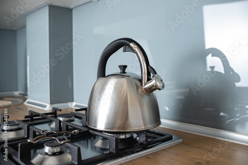 Kettle on a gas stove. Teapot