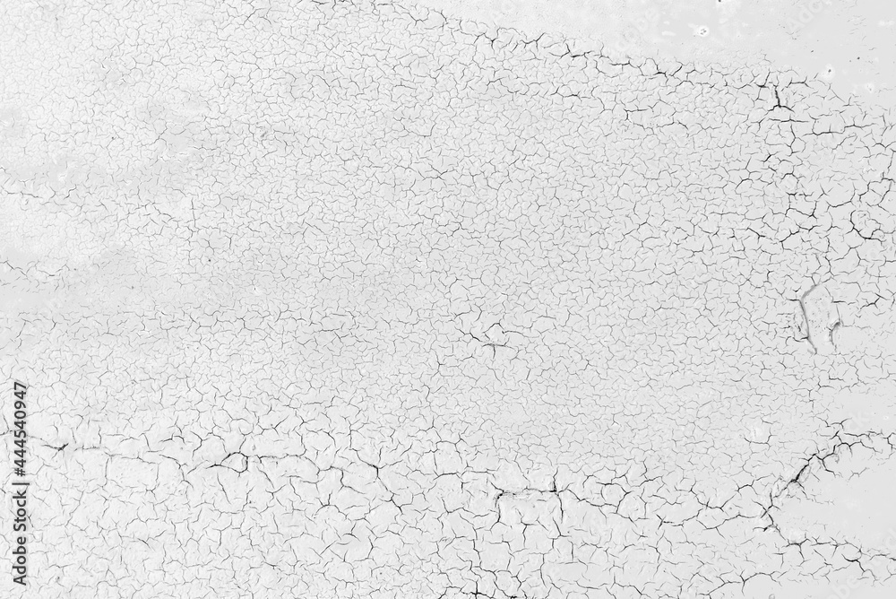 Black and white grunge pattern of natural enamel paint crackle. Cool texture of cracks, stains, scratches, splash, etc for print and design. Crackle paint overlay.