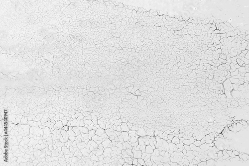 Black and white grunge pattern of natural enamel paint crackle. Cool texture of cracks, stains, scratches, splash, etc for print and design. Crackle paint overlay.