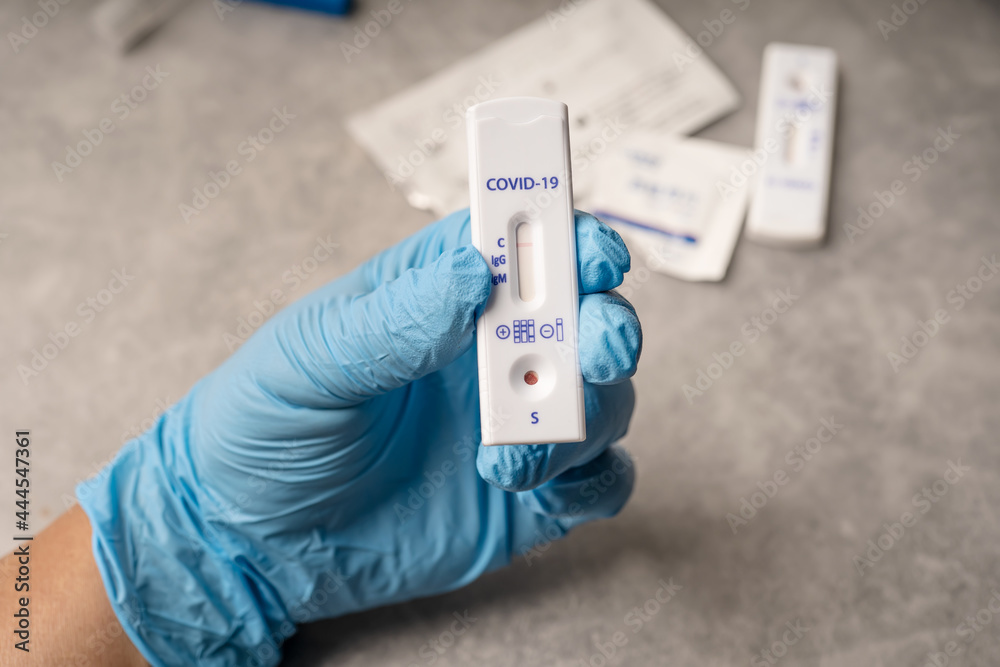 Man holding Corona Covid-19 Rapid Antigen Test ,Antibody Test with negative result Man holding Corona Covid-19 Rapid Antigen Test ,Antibody Test with negative result
