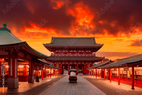 Japan  Tokyo. Asakusa Temple in red. Sensoji Temple under red sky. Buddhism concept. Buddhist temple without people. Asakusa Street with souvenir shops. Hand washing bowl in front of Buddhist temple