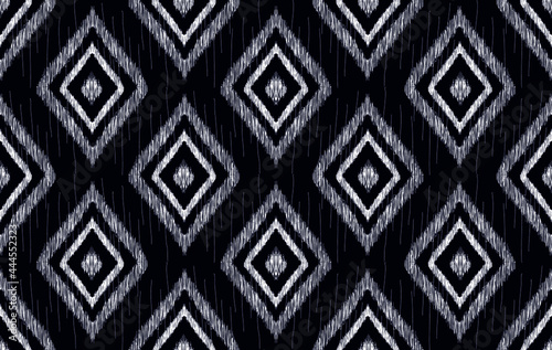 Ethnic pattern ikat textile Aztec fabric carpet mandala native texture vector illustrations background wallpaper.