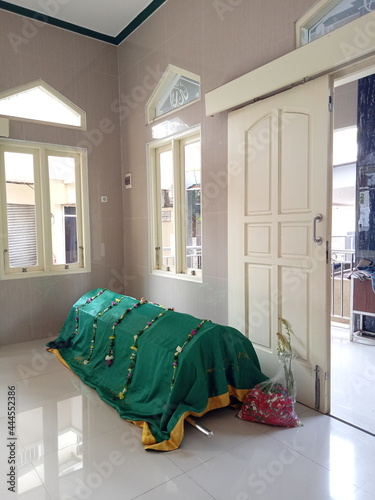 death man or jenazah, inside keranda or coffin at mosque photo