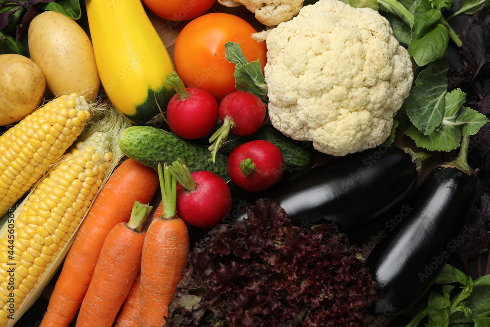 Many different fresh vegetables as background, top view Many different fresh vegetables as background, top view
