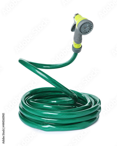 Watering hose with sprinkler isolated on white photo