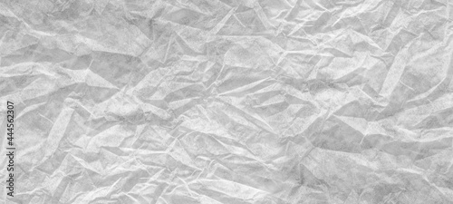 Abstract white fabric texture background cloth soft wave creases of satin and cotton.