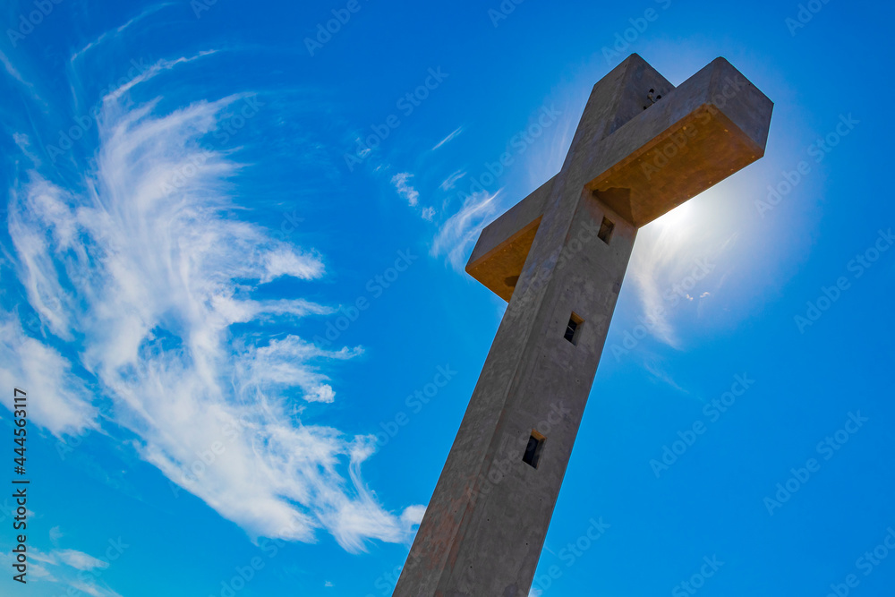 Fototapeta premium Monastery Filerimos Cross on hill Ialysos Rhodes Greece blue background.