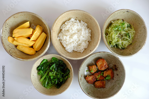 vegan meal, Vietnamese fried vegetable protein, kale soup, chayote and jackfruit