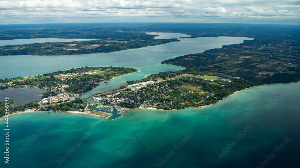 Aerial of Elk Rapids, Elk Lake, and Lake Michigan.