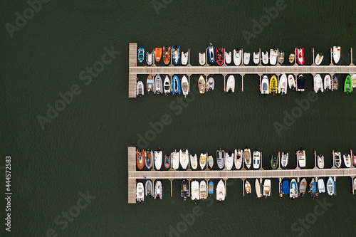 Aerial view of Jetty full of boats and dinghies in a marina