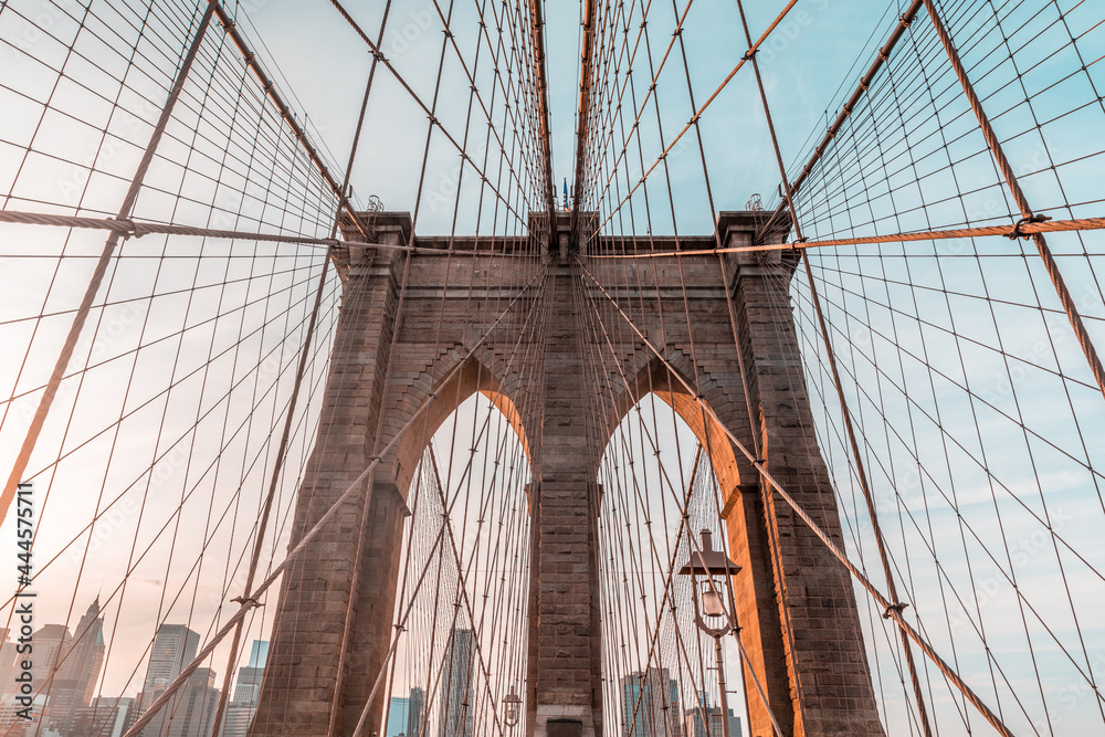 Fototapeta premium New York and Brooklyn bridge close up with Manhattan skyscrapers on background