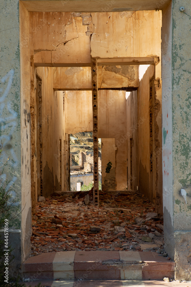 Entrance frame to house in ruins and demolished due to abandonment
