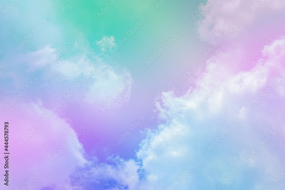 beauty abstract sweet pastel soft green pink with fluffy clouds on sky. multi color rainbow image. fantasy growing light
