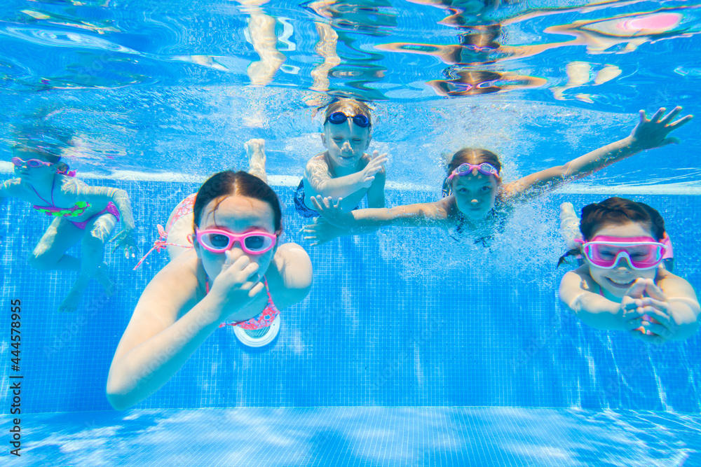 kids swimming in pool
