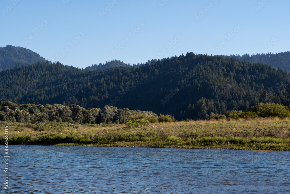 Lake view of mountains after exiting Redwood Forest off the trail of Avenue of the Giants