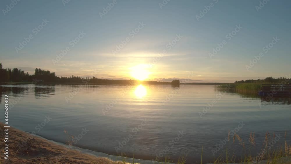 The timelapse of spectacular landscape and very colorful sunset over the calm lake. Beautiful panoramic sunset reflection from lake water. 4k Push through slowmotion video. The timelapse of spectacular landscape and very colorful sunset over the calm lake. Beautiful panoramic sunset reflection from lake water. 4k Push through slowmotion video.