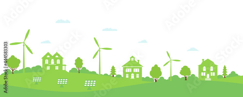 Ecology concept and environment conservation. Green house. Green energy with wind energy and solar panels. Concept of environment conservation.