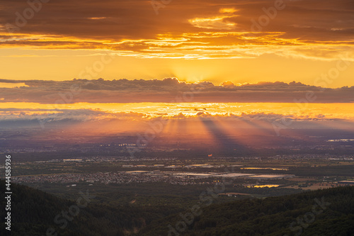 A breathtaking sunset over the Rhine plain, the Alsace and the northern mountains of the Vosges.