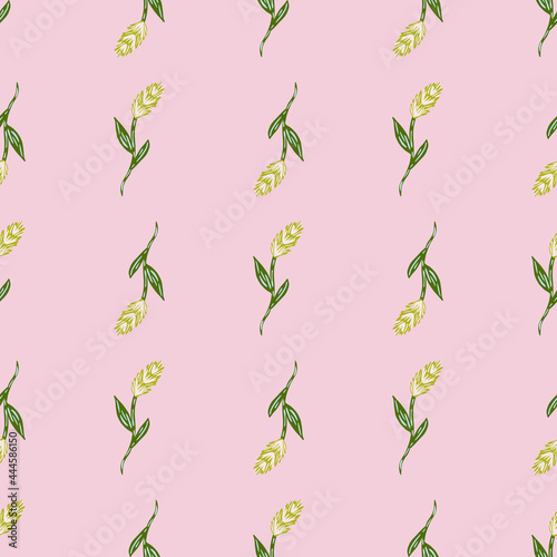 Hand drawn harvest seamless pattern with green little ear of wheat silhoettes. Pastel pink background.
