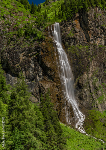 Schleierfall waterfall near Sportgastein place between big mountains photo