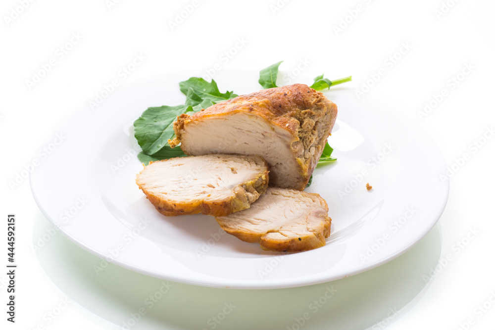 baked chicken fillet pieces with spices and herbs, in a ceramic form baked chicken fillet pieces with spices and herbs, in a ceramic form