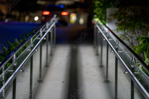 Canvas Print Metal handrail leading to an office building