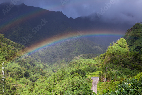 Tahiti. Polynesia. Clouds over a mountain landscape and rainbow