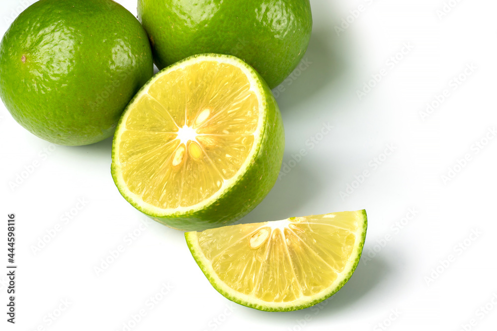 Close up natural fresh lime with sliced,isolated on white background. Close up natural fresh lime with sliced,isolated on white background.