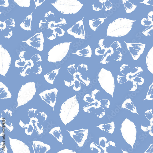 Vector seamless pattern with hand-drawn flowers and leaves on blue tender background.