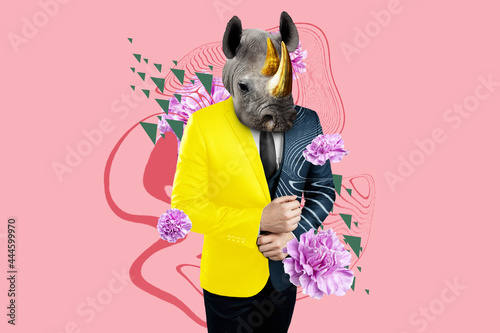 Modern design, A body in a business multi-colored suit with a rhinoceros head, personality, character. Bright trendy colors, shocking art, style for a magazine, fashionable web design. copy the space. © Aliaksandr Marko