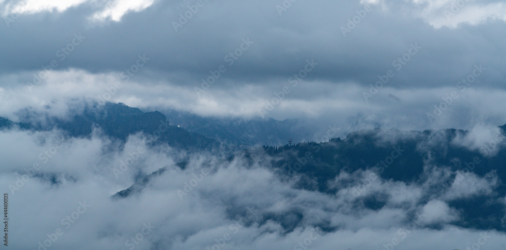 Fototapeta premium clouds over the mountains