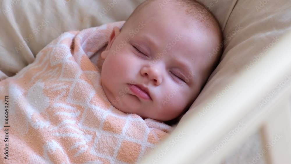 Safe Sleep Environment for Baby in Cotton Swaddle. Adorable Newborn Baby Sleeping Swaddled in Bed. New Born Taking a Nap in Crib. Swaddling For Infants. Little Kid Wrapped in Warm Blanket Relaxing. Safe Sleep Environment for Baby in Cotton Swaddle. Adorable Newborn Baby Sleeping Swaddled in Bed. New Born Taking a Nap in Crib. Swaddling For Infants. Little Kid Wrapped in Warm Blanket Relaxing.
