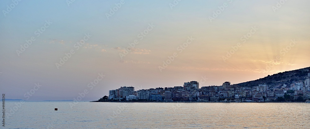 Seascape of mediterranean city during sunset