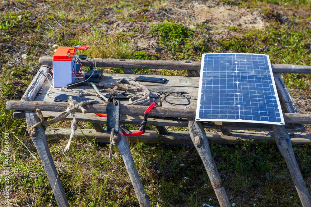 tundra residents use solar panels to charge mobile phones tundra residents use solar panels to charge mobile phones
