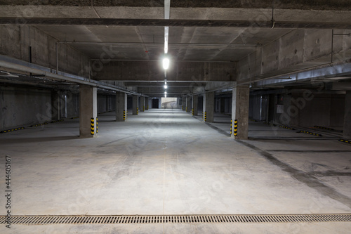 Empty underground parking. Free parking spaces. Alternative parking. Parking for cars within the city