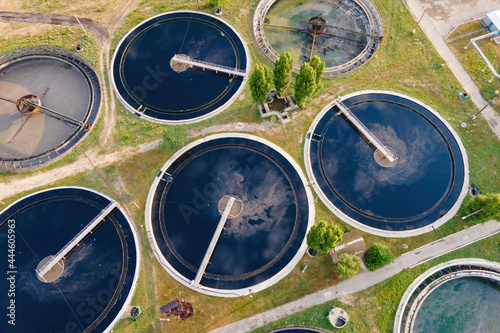 Round sedimentation tanks of wastewater treatment plant, filtration of dirty or sewage water. Sewage treatment concept.