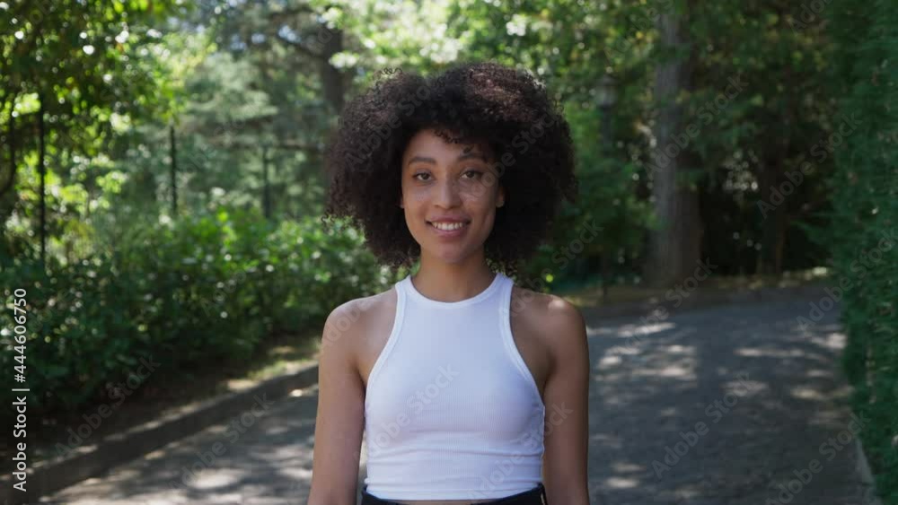 beautiful smiling girl walks on the street, nature beautiful smiling girl walks on the street, nature